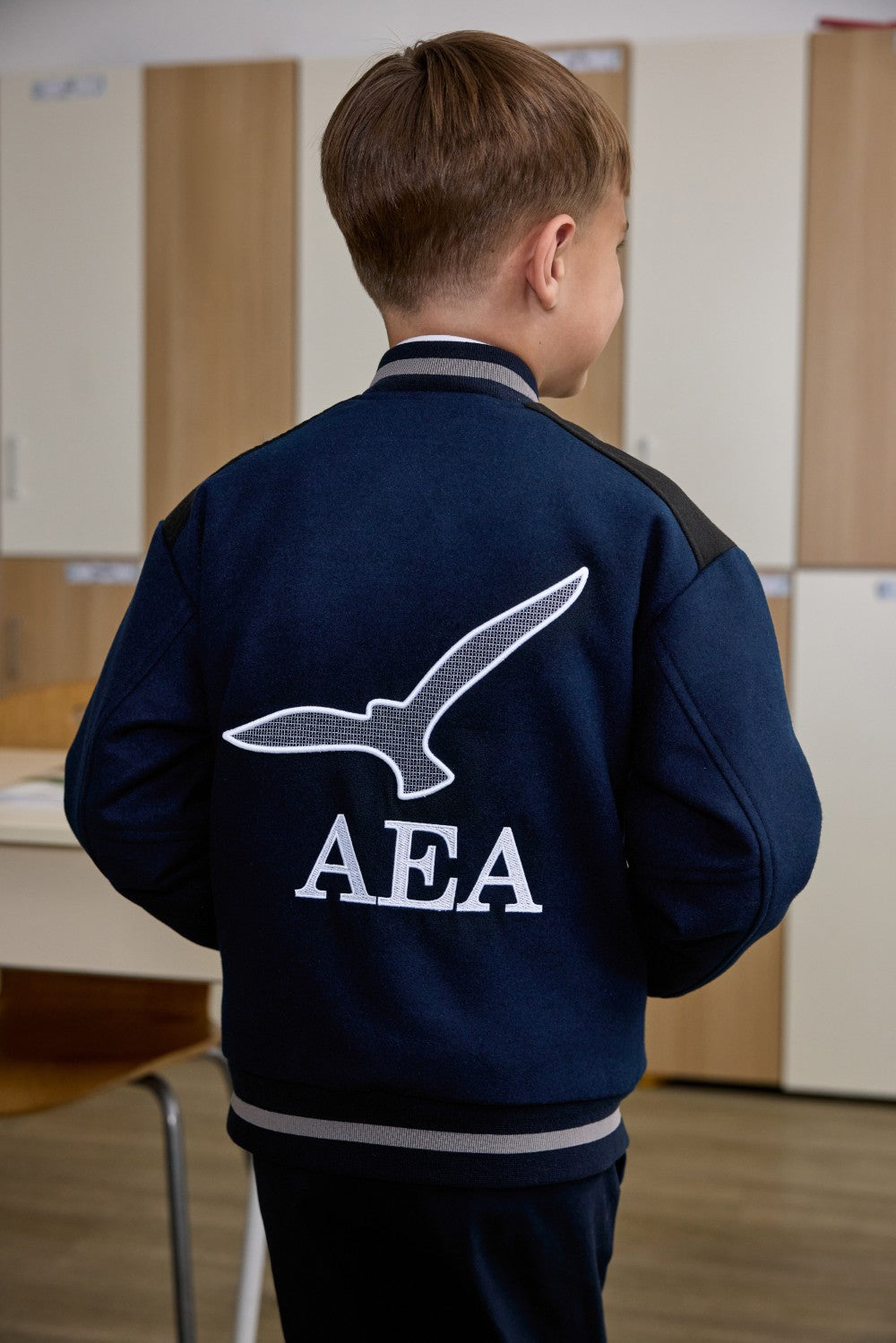 Бомбър яке за момчета с капитонирана подплата